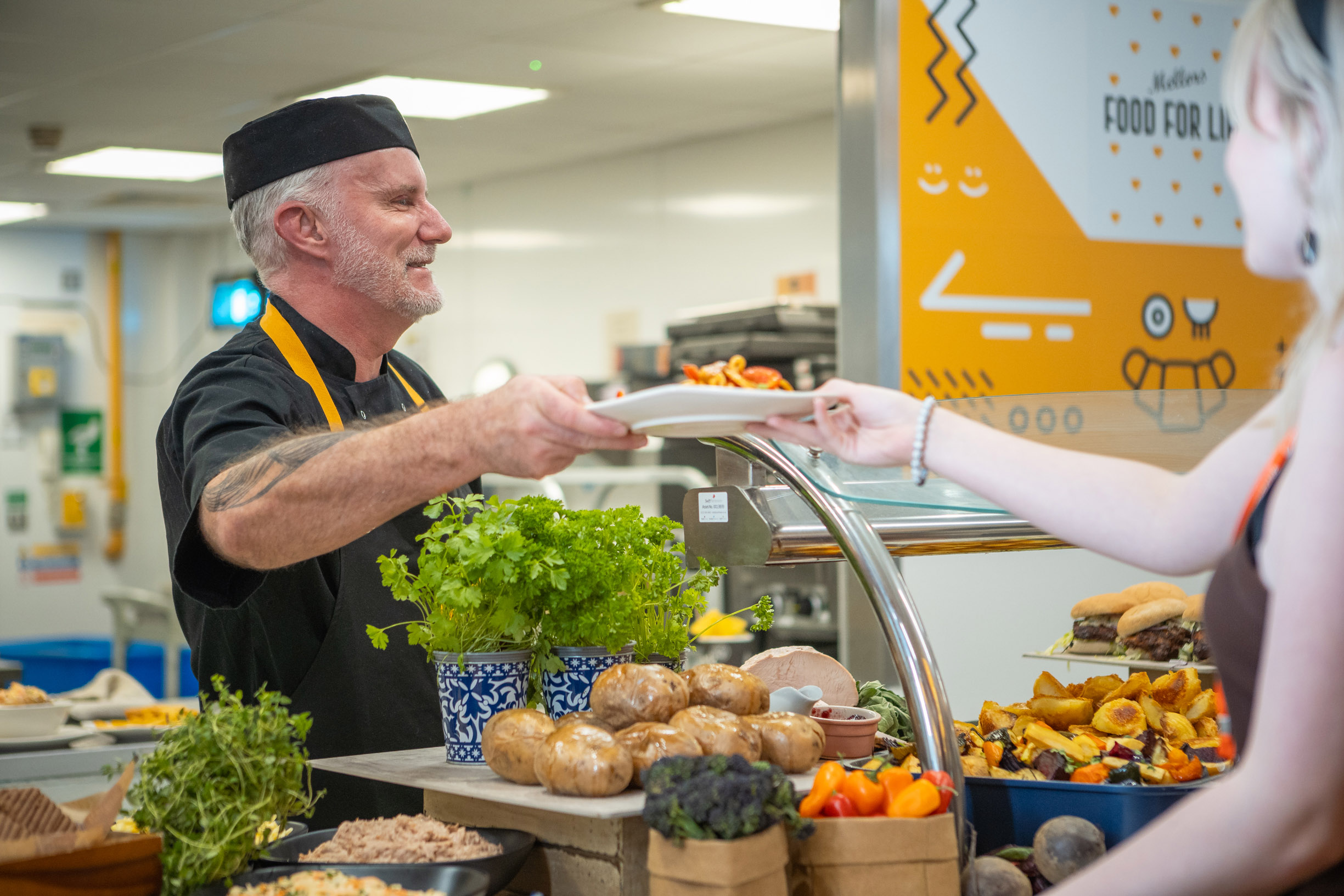 mellors caterer serving