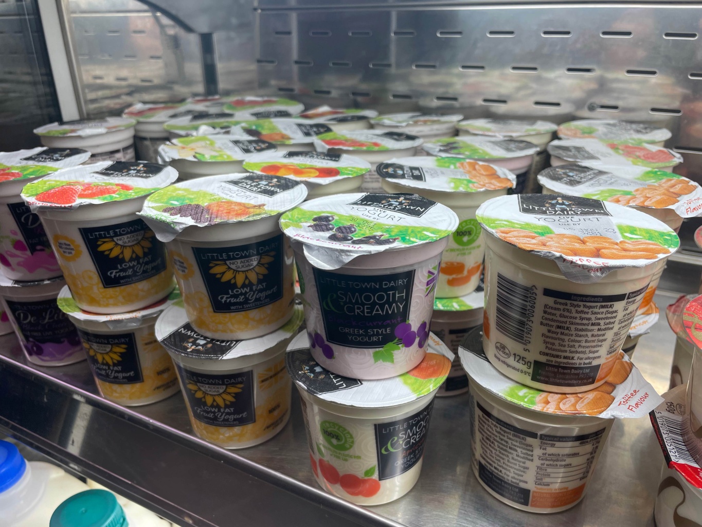 yoghurts in a fridge unit